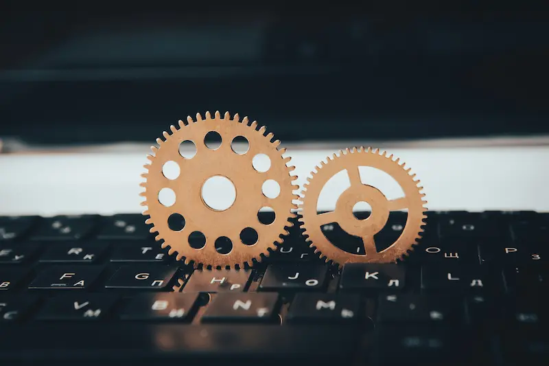 gears fitting together on top of a keybord